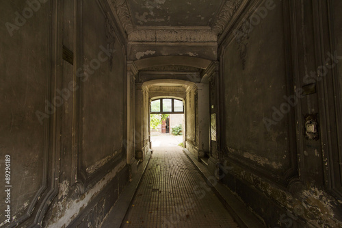 Decayed corridor in an abandoned residential building