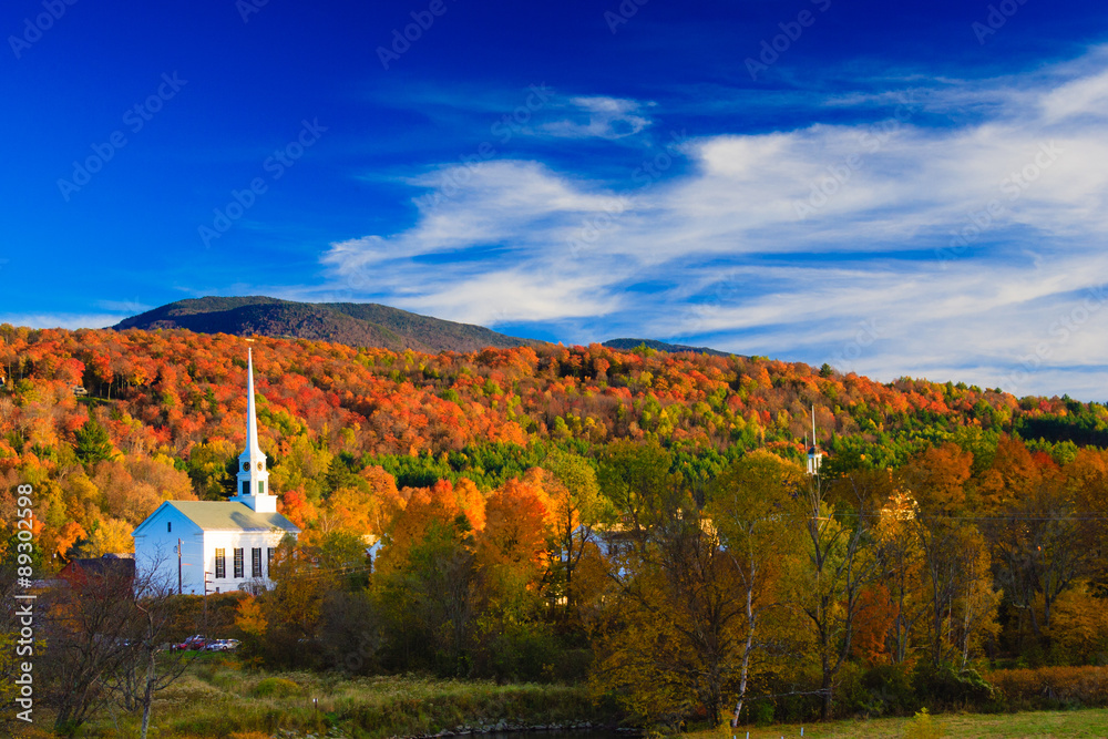 Fototapeta premium Rural Vermont town during peak foliage season.