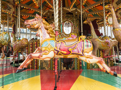 Horses on a traditional vintage carousel