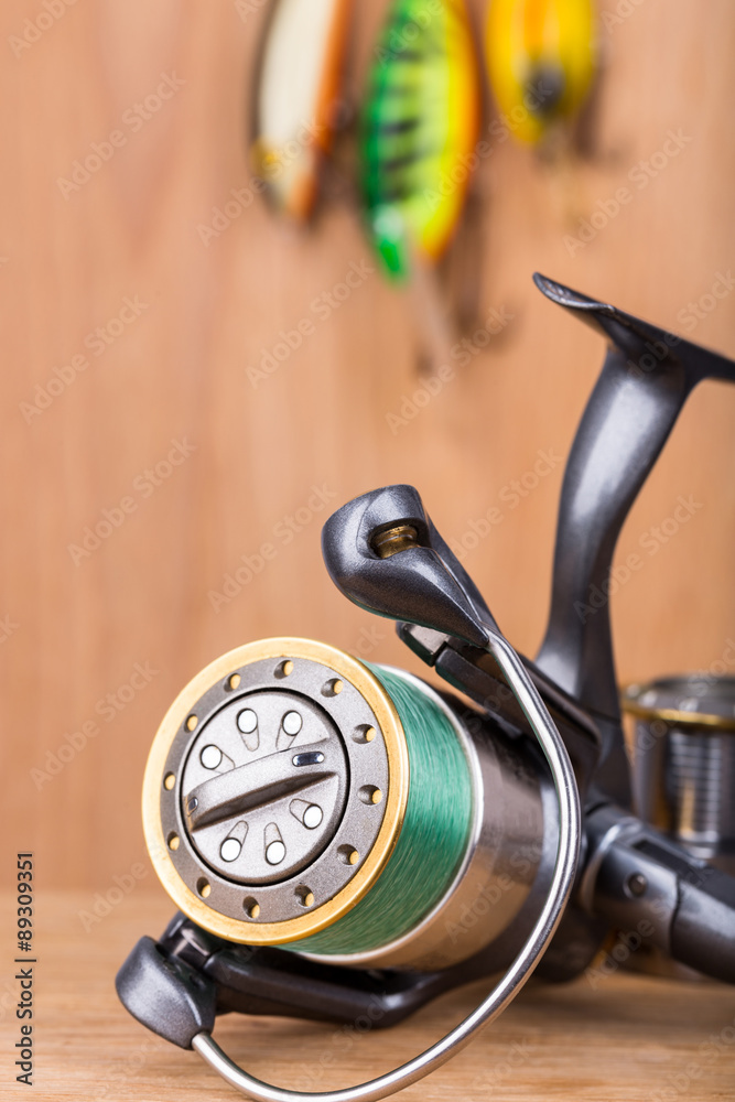 Fototapeta premium fishing bait wobbler and reel with line