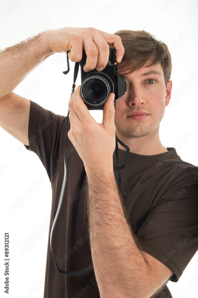 Young professional photographer shooting in the studio Young professional photographer shooting in the studio