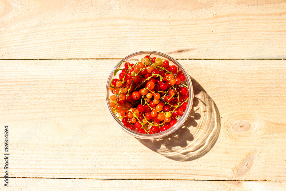 Red currants in a glass jar top view Red currants in a glass jar top view