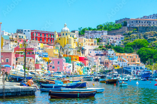 italian island procida is famous for its colorful marina, tiny narrow streets and many beaches which all together attract every year crowds of tourists coming from naples - napoli. photo