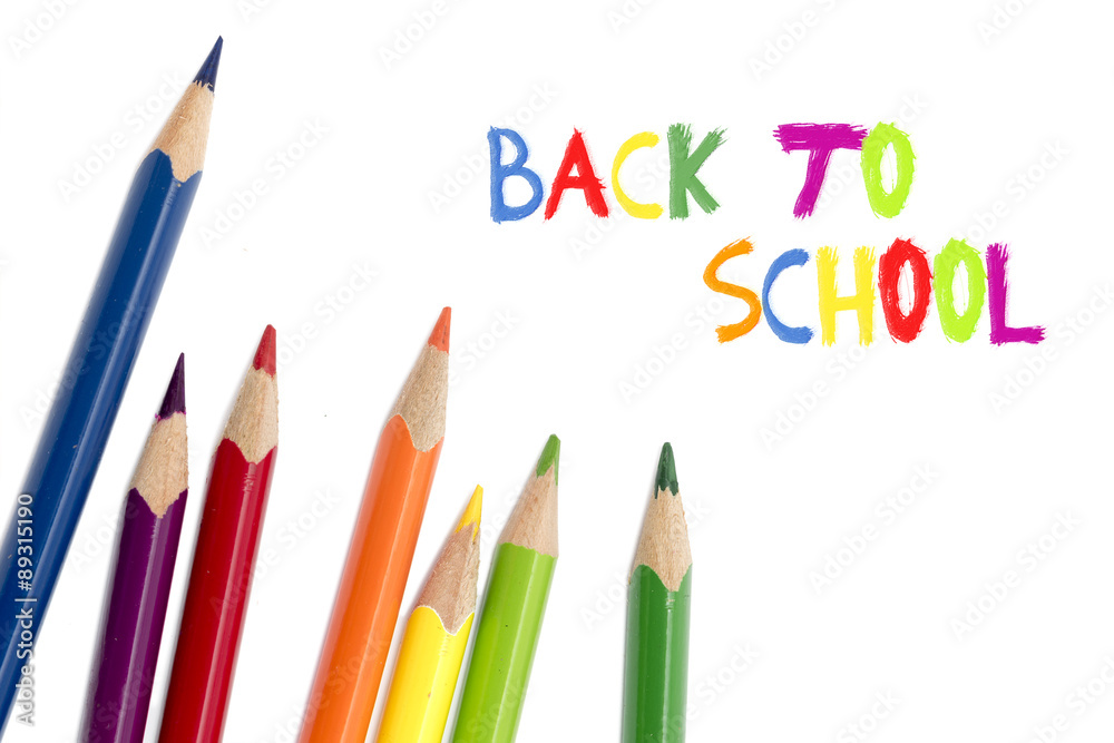 Fototapeta colored pencils isolated on white and text back to school