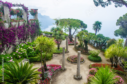 view of green garden of the famous vila rufolo in italian city ravello. photo