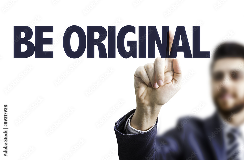 Business man pointing the text: Be Original Business man pointing the text: Be Original