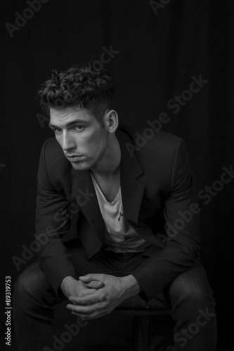 Male model posing in the dark black and white shot © dexailo