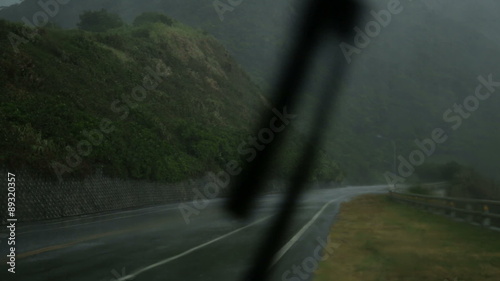 Heavy rain from inside car with windscreen wiper going
