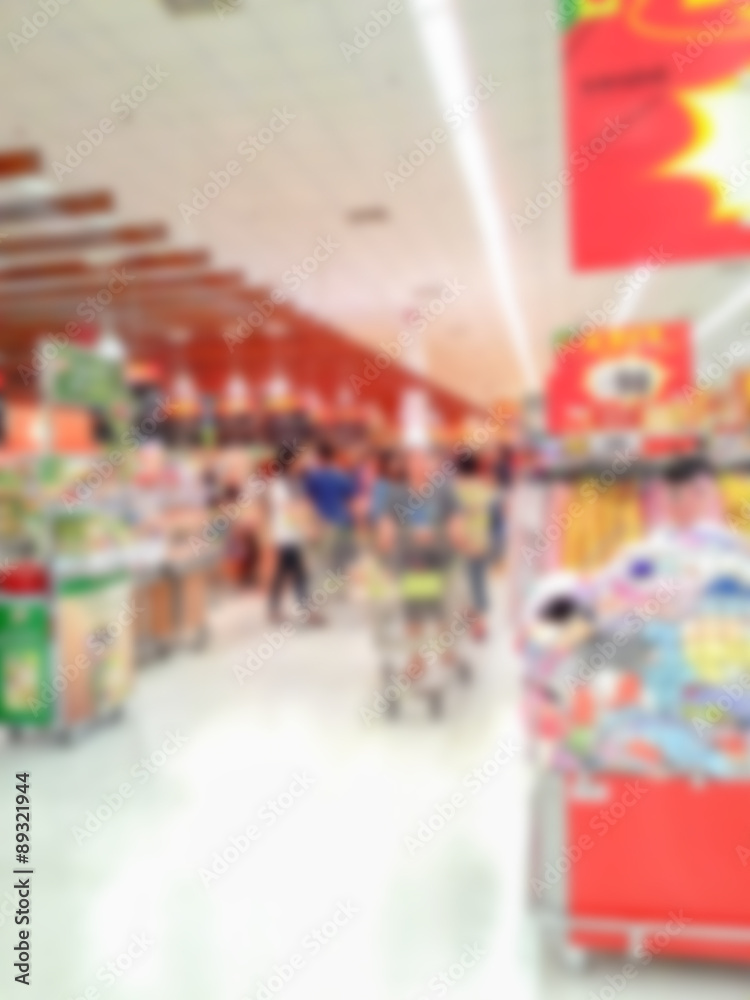 Obraz premium Blur of people shopping in supermarket.