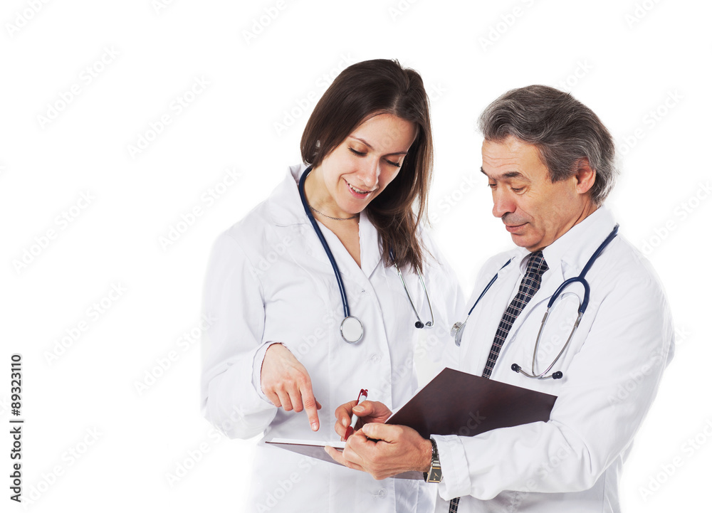An experienced doctor explains the diagnosis to the girl with th An experienced doctor explains the diagnosis to the girl with th