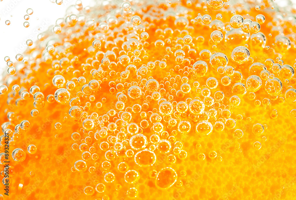 fresh orange with bubbles