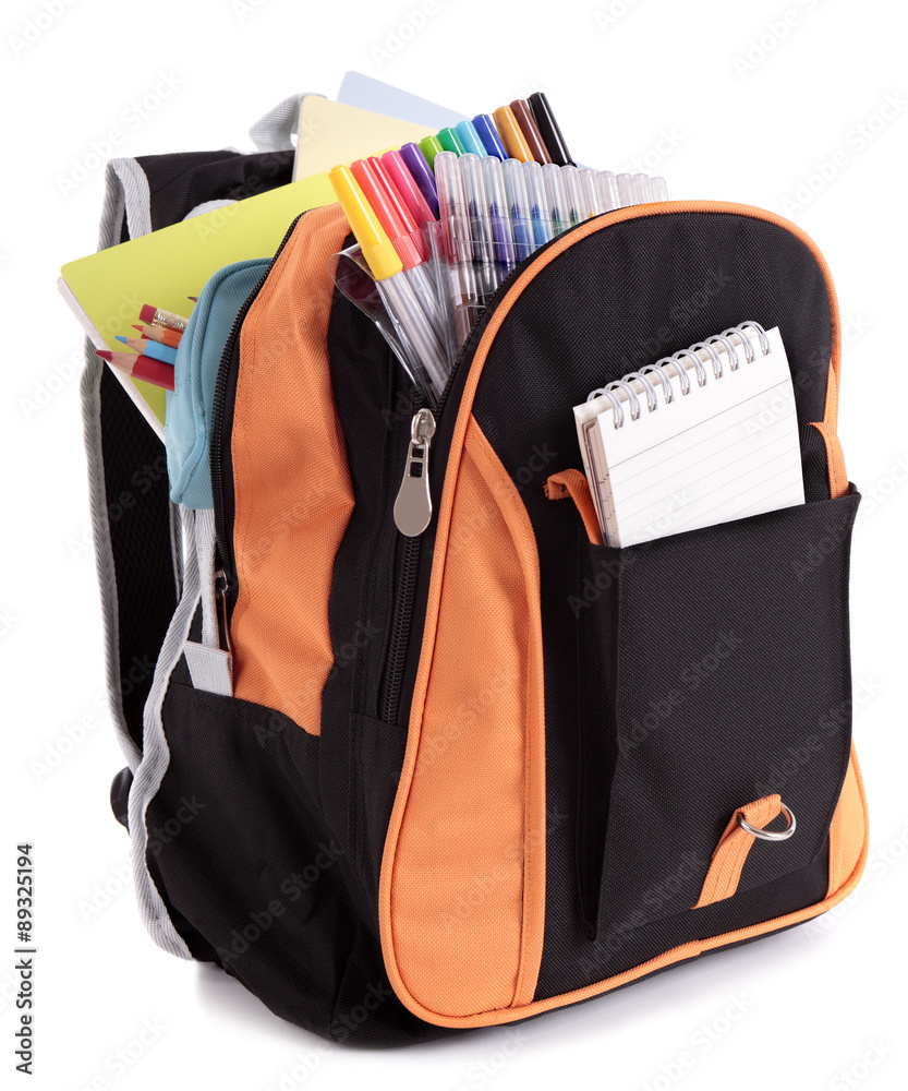 School satchel bag backpack with various books pencils crayons and study  equipment isolated on white background photo Photos | Adobe Stock