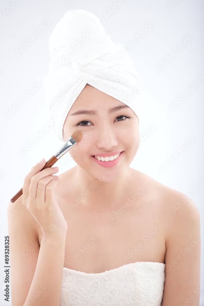 Applying concealer Applying concealer