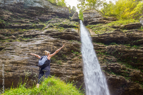 Active sporty woman relaxing in beautiful nature. photo