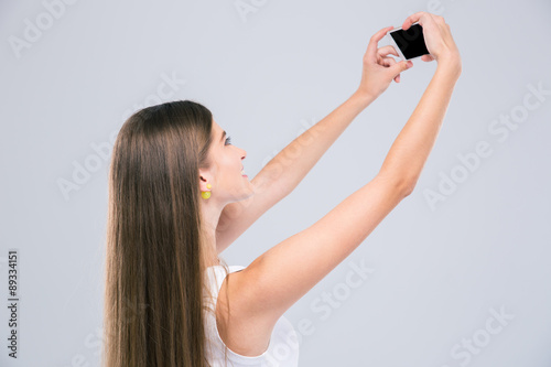 Female teenager making selfie photo