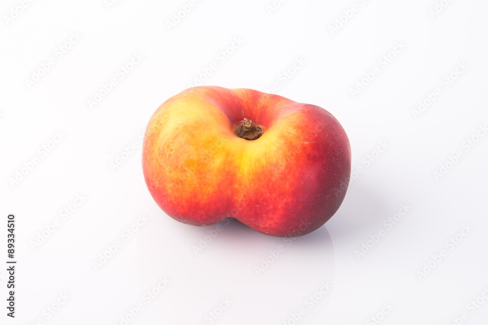 flat peaches (donut peaches) on a background flat peaches (donut peaches) on a background