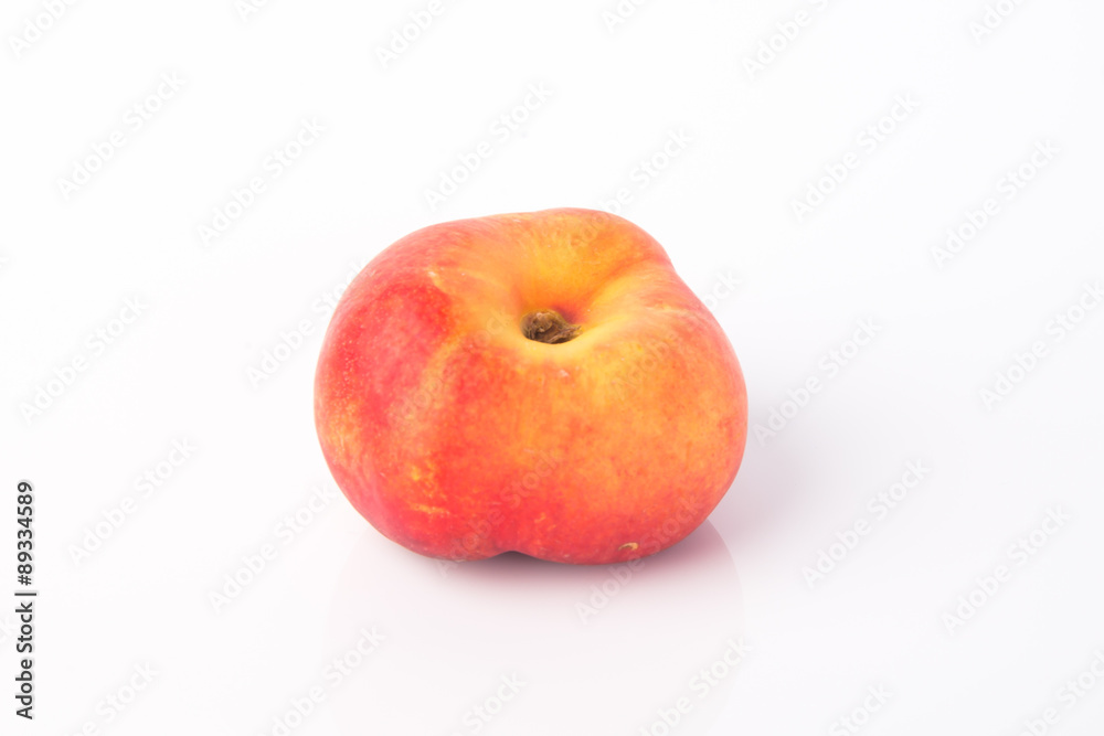 flat peaches (donut peaches) on a background flat peaches (donut peaches) on a background