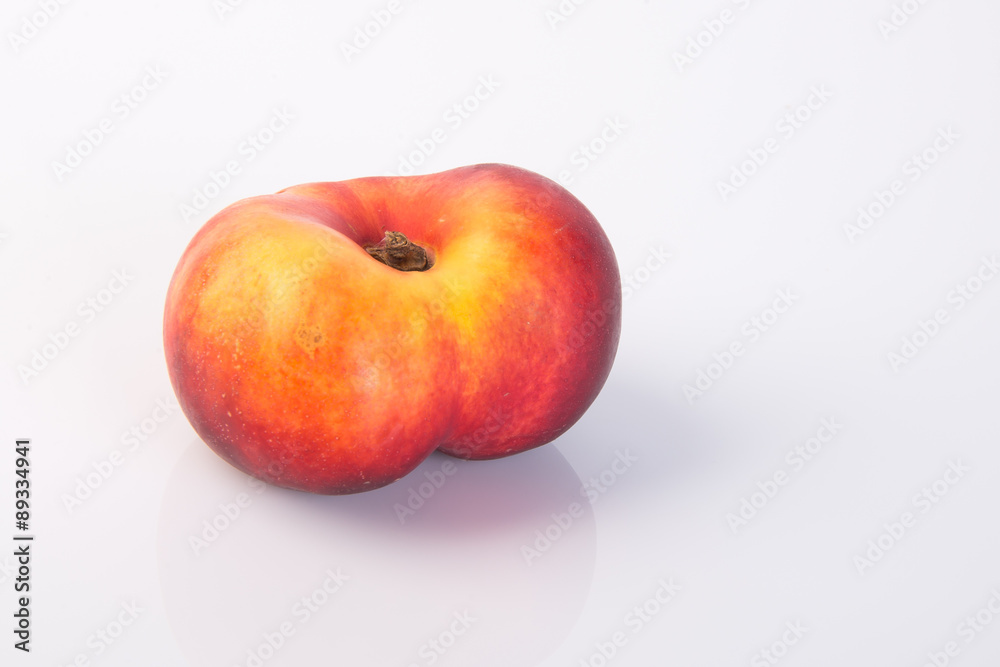 flat peaches (donut peaches) on a background flat peaches (donut peaches) on a background