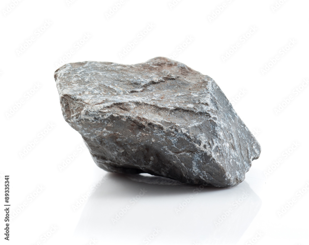 Fragment of granite on a white background. Fragment of granite on a white background.