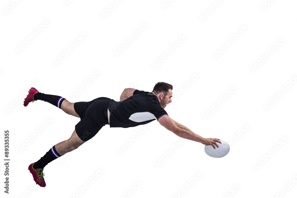 Fototapeta Rugby player scoring a try