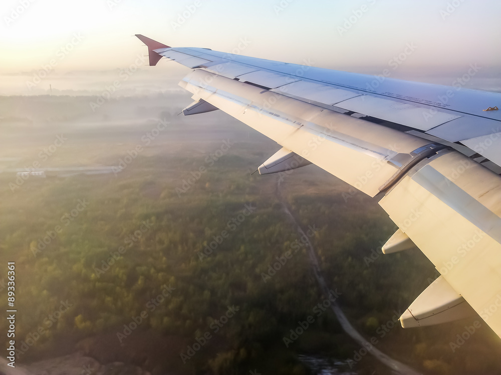 Fototapeta premium Sunset view from airplane