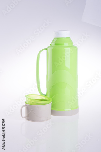 Thermo, Plastic Thermo flask on background.
