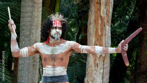 Yugambeh Aboriginal warrior throwing boomerang photo