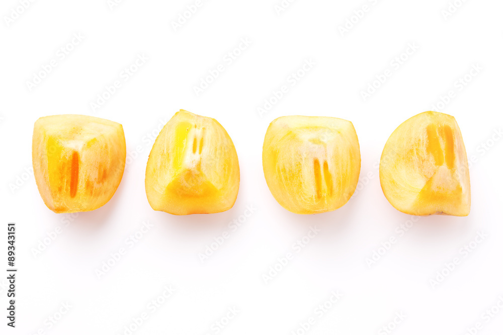 Fresh Persimmons in Row Isolated on White Background.