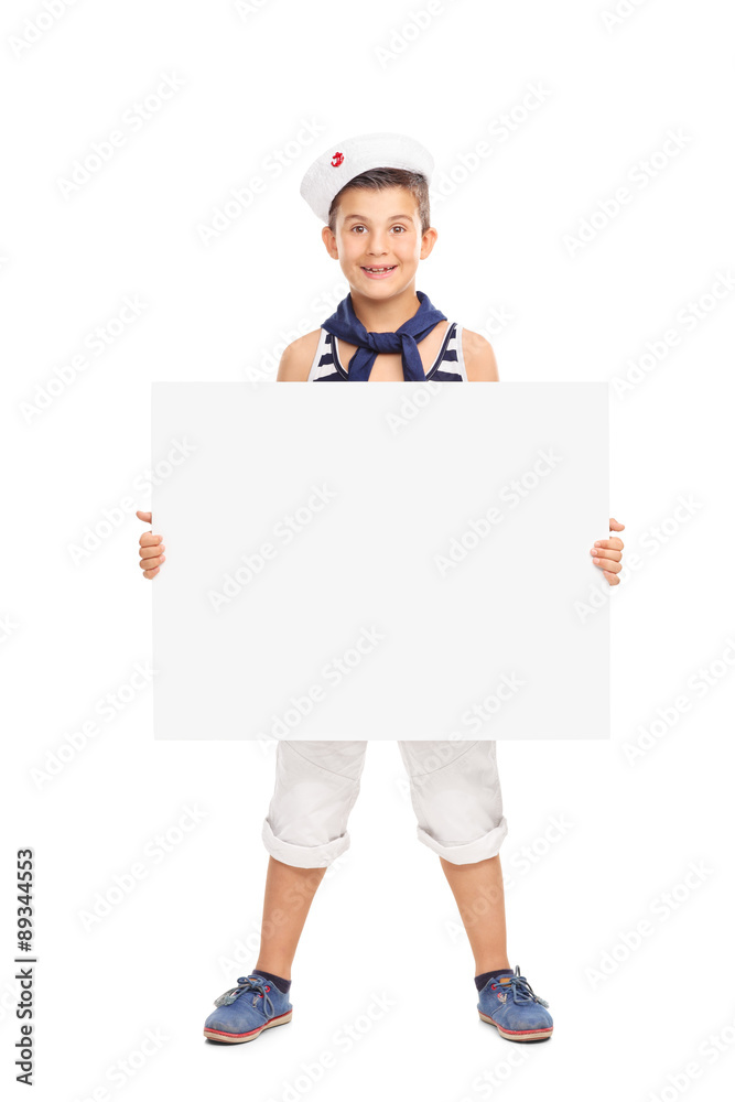 Little kid in sailor outfit holding a big blank banner Little kid in sailor outfit holding a big blank banner