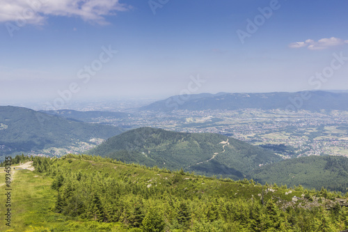 Fototapeta Naklejka Na Ścianę i Meble -  Mountain landscape from Skrzyczne. Hillside covered with pine tr