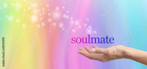 Fotografie Seeking a Soulmate - female hand palm up with the word Soulmate floating above,