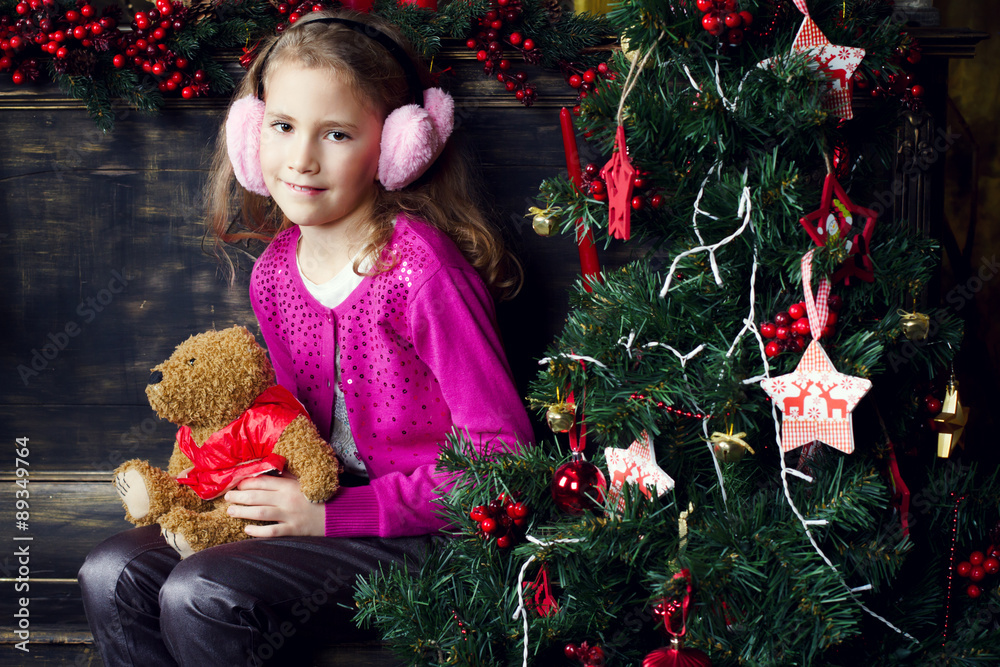 cute little girl in Christmas decorations