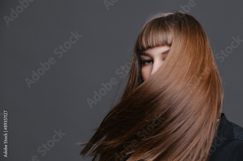 Young Woman Shaking Hair