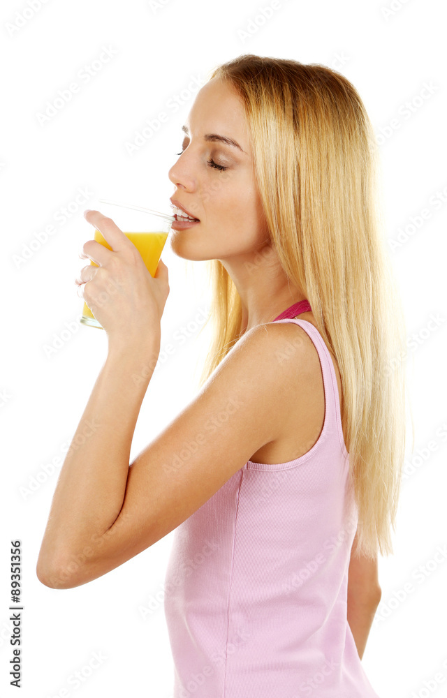 Young beautiful woman with glass of fresh orange juice, isolated on white Young beautiful woman with glass of fresh orange juice, isolated on white