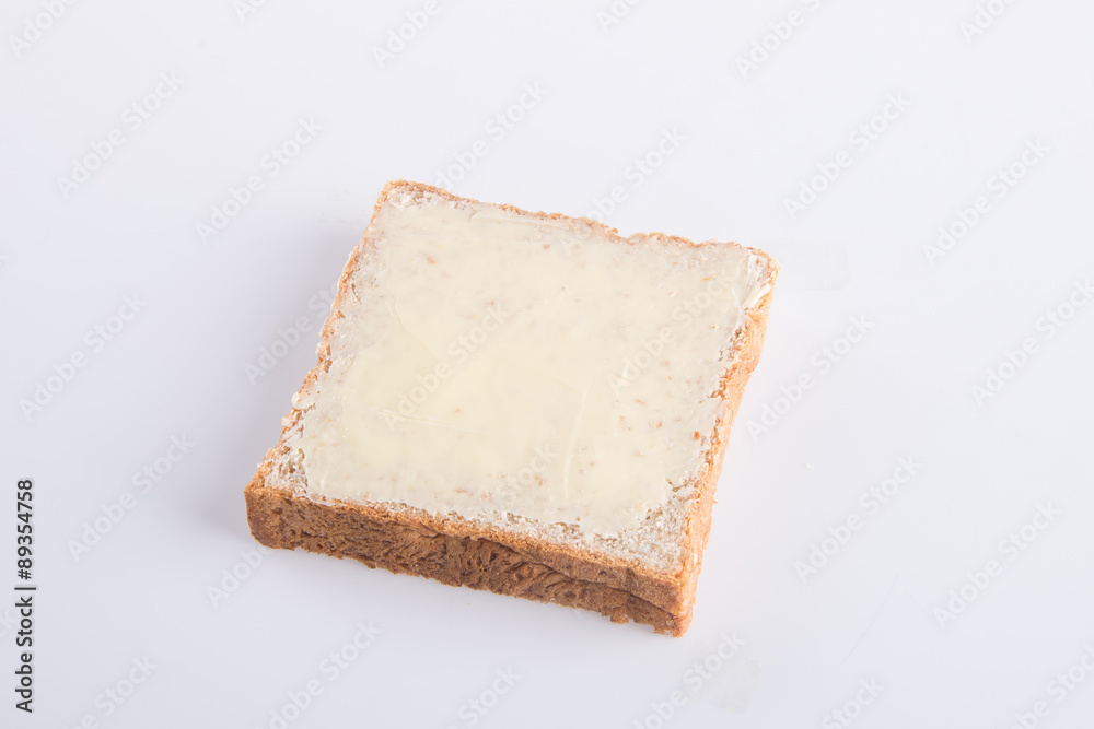 bread. bread with butter on a background