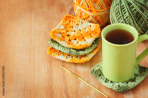 Handmade colorful crochet granny afghan square, cup of tea