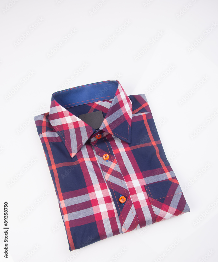 shirt. mens shirt folded on a background shirt. mens shirt folded on a background
