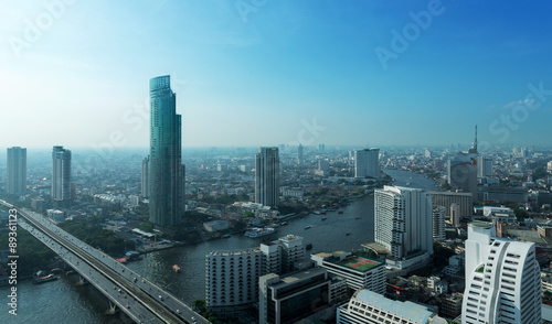 Chao Phraya river and high building sky scrapper in heart of ban
