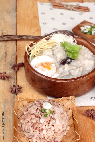 Brown rice porridge put pork and brown rice with soft-boiled egg