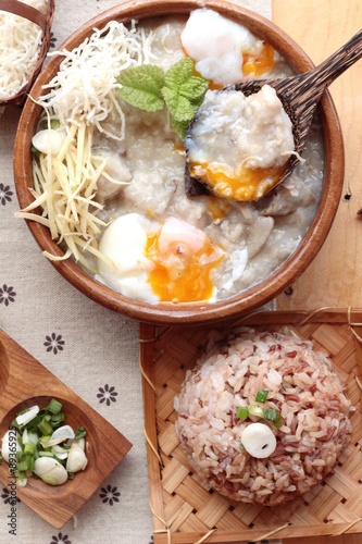 Brown rice porridge put pork and brown rice with soft-boiled egg