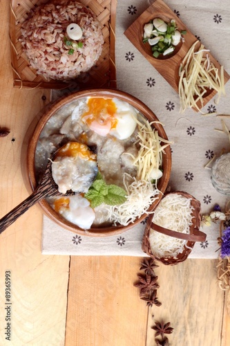 Brown rice porridge put pork and brown rice with soft-boiled egg