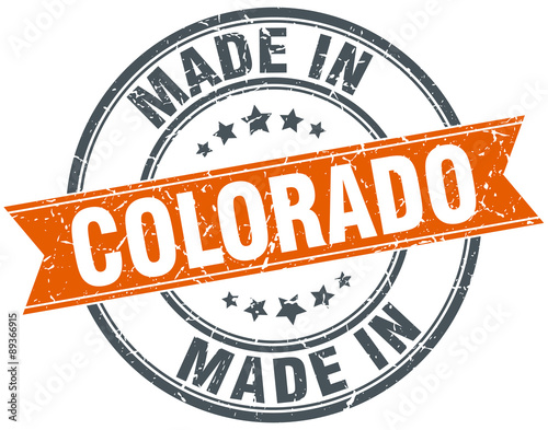 Colorado orange grunge ribbon stamp on white