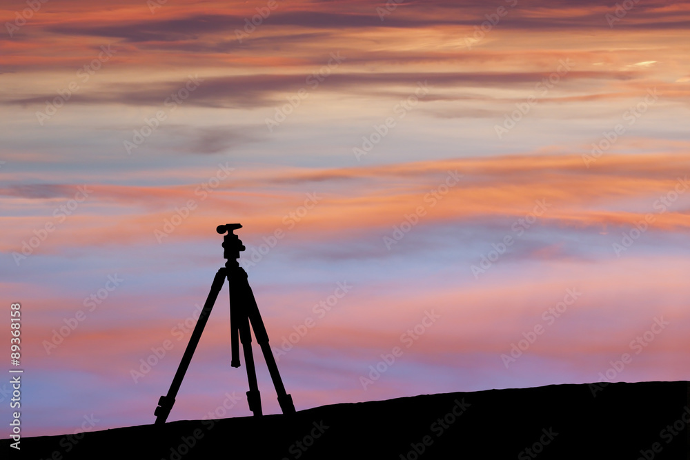 Silhouette of tripod under the sky at sunset - Beautiful sky, Dramatic sunset. Silhouette of tripod under the sky at sunset - Beautiful sky, Dramatic sunset.