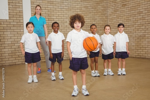 Students together about to play basketball