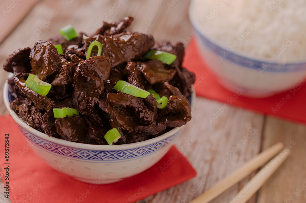 Concept of chinese food. Soy sauce cooked beef with star anise. Red cooked beef with rice and chopsticks Concept of chinese food. Soy sauce cooked beef with star anise. Red cooked beef with rice and chopsticks