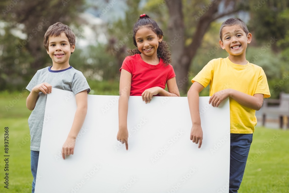 Cute pupils showing large poster Cute pupils showing large poster