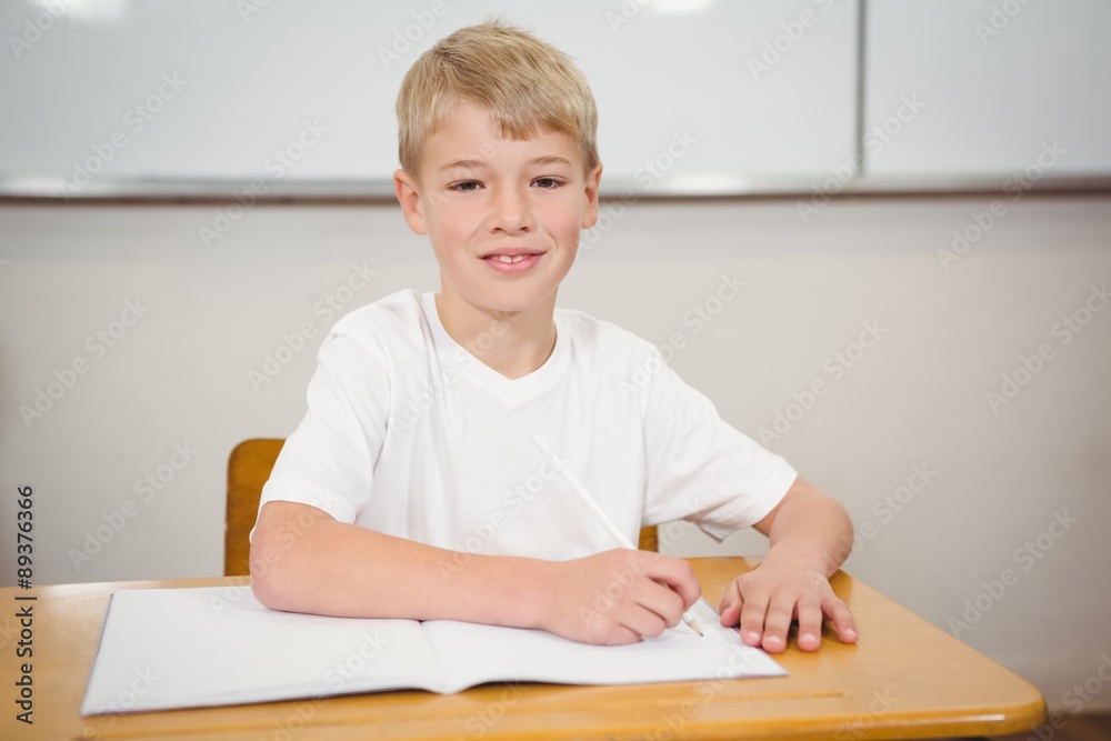 Pupil sitting at a school desk Pupil sitting at a school desk
