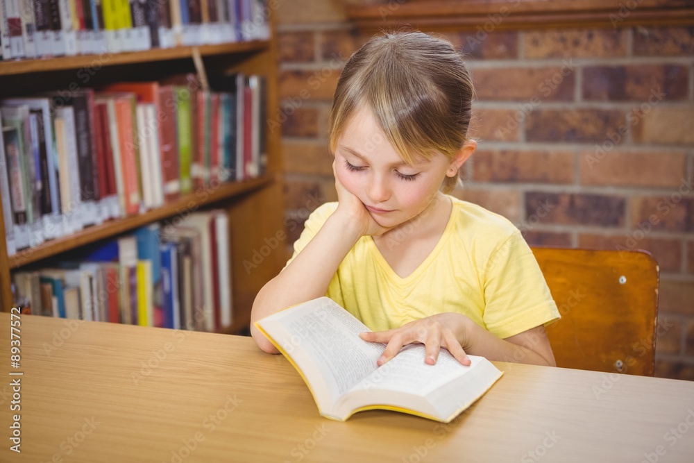 Student reading a book Student reading a book