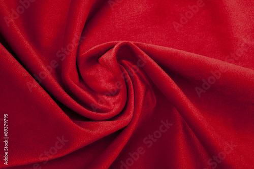 shiny red fabric - arranged in a whirl