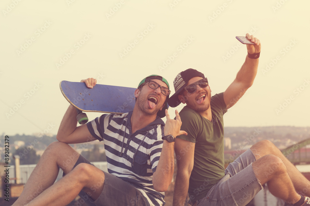 Couple of guys doing a selfie. Couple of guys doing a selfie.